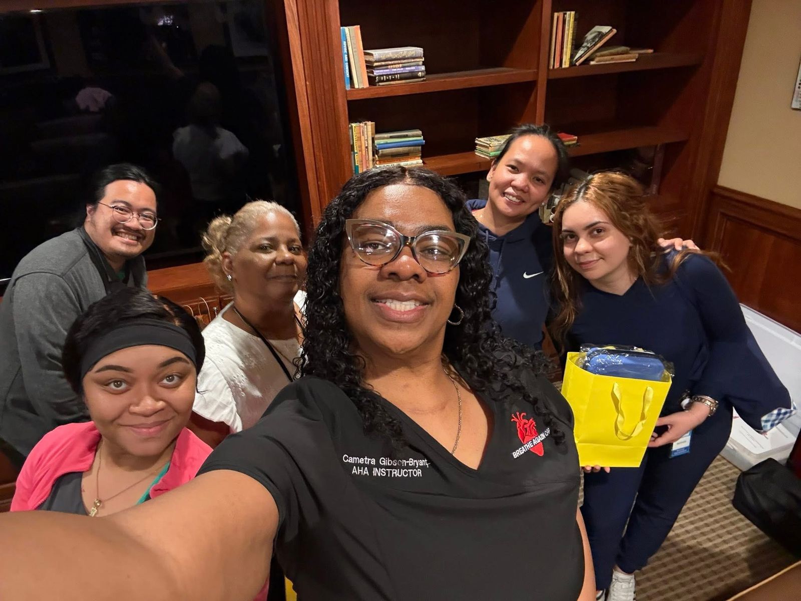 Cametra Gibson-Bryant with a group of her CPR students.